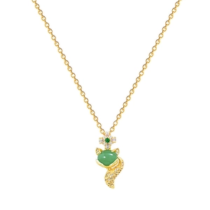 Elegant gold titanium necklace with a green zircon fox pendant and sparkling diamonds