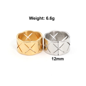 Detail showing gold and silver titanium steel rings with quilted pattern and 12mm height
