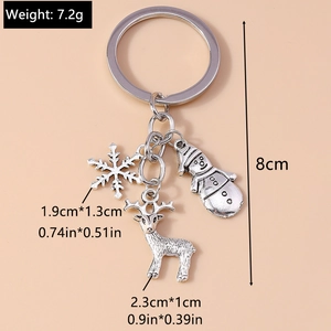 Detailed size specifications for silver Christmas snowflake and reindeer keychain charms