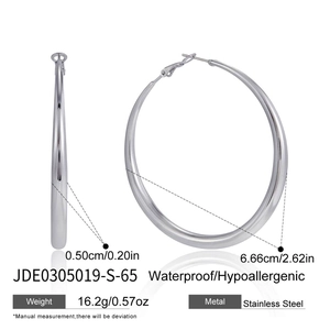 Detailed view of silver stainless steel hoop earrings with size dimensions 6.66cm diameter