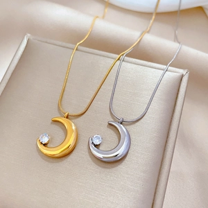 Minimalist moon crescent pendant necklace with zircon in gold and silver finishes