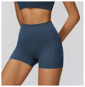 Detail shot of high-waist ruched yoga shorts in dark grey blue with seamless fabric