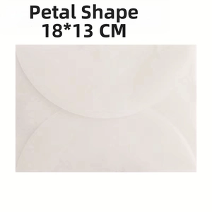 Detailed view of 18x13cm white translucent envelope with unique petal shape closure