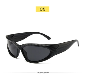 Detail showing carbon fiber texture on black steampunk cycling glasses frame side