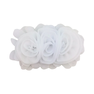Detail of white chiffon rose flower hair clip with three handmade 3D floral petals