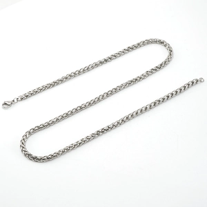 Detailed macro view of a durable silver wheat chain with secure lobster clasp closure