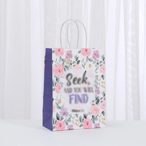 Floral kraft paper gift bag with white twist handles and Seek inspirational quote print