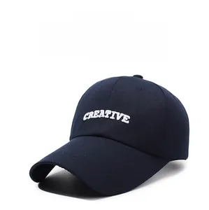 Close-up of navy blue cotton baseball cap with white 3D Creative letter embroidery