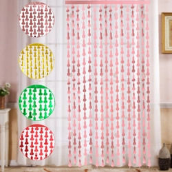 Detailed view of rose gold phallic-shaped foil fringe curtains for bachelorette parties