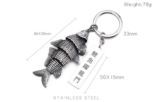 Detail of stainless steel koi fish keychain with movable bone design and dimensions