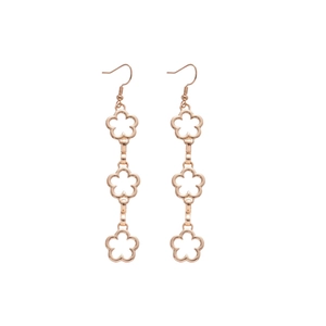 Rose gold hollow flower tassel earrings set on a clean white background minimalist style