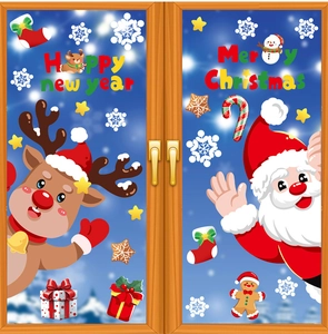 Detail of Christmas window stickers featuring Santa, reindeer, and snowman in a snowy scene