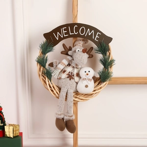 Christmas rattan wreath with plush reindeer and snowman toys with a Welcome sign