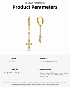 Detail of 925 sterling silver long cross earrings with 18K gold and 5A cubic zirconia