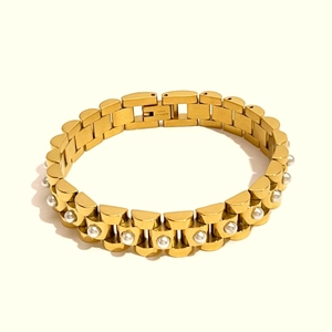 Luxurious 18K gold plated stainless steel watch-style bracelet with white pearl inlays