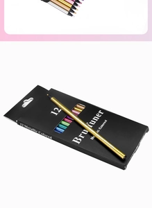 Macro detail of a golden metallic colored pencil on a 12-piece black windowed box