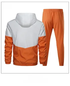 Back view of orange and white hooded tracksuit set with elastic waist sports trousers
