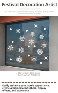 Detailed close-up of white Christmas snowflake static window stickers for festive shop displays
