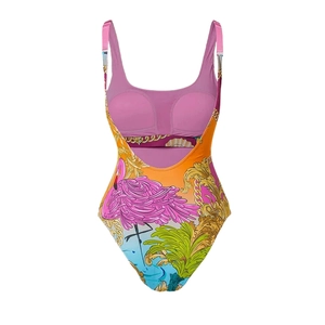 Detail of pink flamingo and green tropical print on baroque style one-piece swimsuit