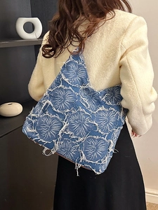Retro washed denim tote bag with white flower embroidery and fringed edges for women