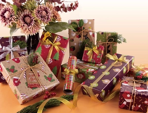 Christmas gift wrapping set with festive patterns, colorful ribbons and decorative tags