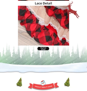 Detailed close-up of red and black buffalo plaid Christmas tree skirt with lace trim