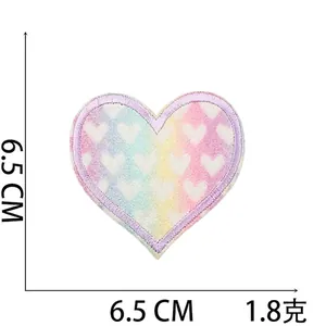 Detailed view of rainbow heart embroidery patch with purple edges, 6.5cm size