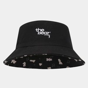 Detail of black cotton sun hat showing 'the bear' embroidery and bear pattern lining