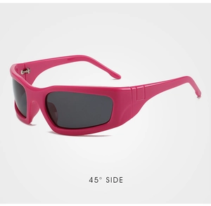 Detail view of pink sports sunglasses frame and wide temples in 45-degree side angle