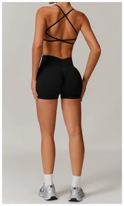 Close-up of black high-waisted seamless yoga shorts with scrunch butt lifting detail
