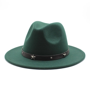 Detail of dark green wool fedora hat featuring star-studded black leather decorative band