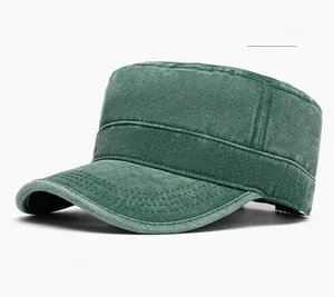 Side view of olive green washed cotton military flat top cap with vintage distressed texture