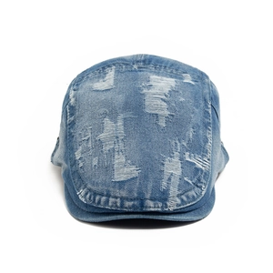 Retro washed denim beret cap with distressed ripped details and vintage street style