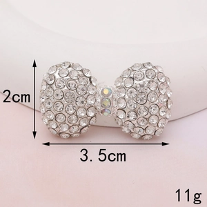 Detail view of crystal rhinestone bow charm showing dimensions 3.5cm by 2cm and weight 11g