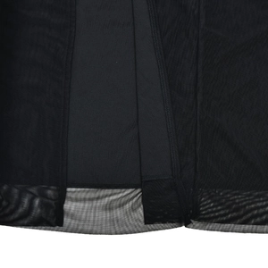 Detail shot of multi-layer black mesh fabric with high-quality stitching on evening gown