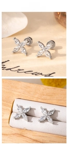 Detailed close-up of clover flower stud earrings with marquise zircon and screw back