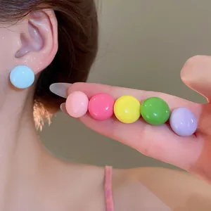 Colorful ball stud earrings set in vibrant candy colors for a playful and sweet aesthetic