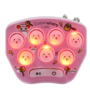 Mini pink handheld whack-a-mole game keychain with LED lights and puzzle game buttons
