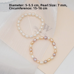 Detail view of 7mm freshwater rice pearls in white and multicolor shades on a soft background