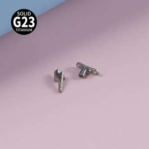 Lightning bolt dermal anchor top and base made of G23 titanium with certified logo