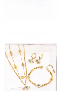 Detail of gold titanium jewelry set featuring blue evil eye charms and layered chains
