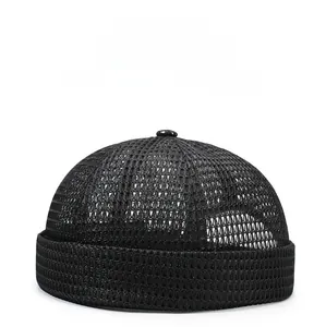Detail of black mesh miki hat showing breathable knit texture and rolled brim
