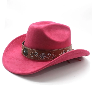 Detail of rose red suede cowboy hat featuring brown leather band and floral embroidery