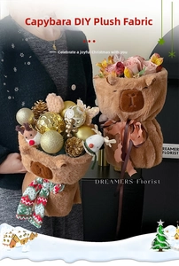 Close-up of plush Capybara bouquet wrap with festive scarves and holiday decorations