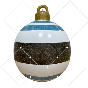Close-up of inflatable Christmas ball with blue patterns and gold hanging hook