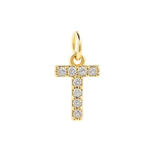 Detail of 18k gold letter T pendant with micro-pave cubic zirconia on white background
