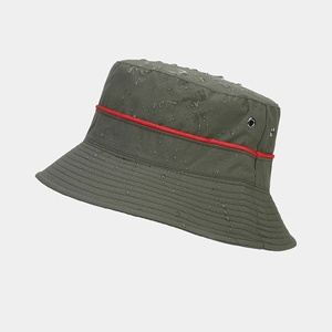 Detail of water droplets on waterproof olive green outdoor bucket hat with red line