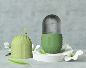 Detailed view of green silicone ice roller with shell texture and frozen ice mold on top