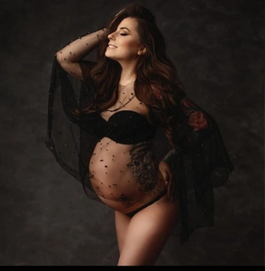 Detailed view of sheer black maternity tulle robe with delicate pearl embellishments