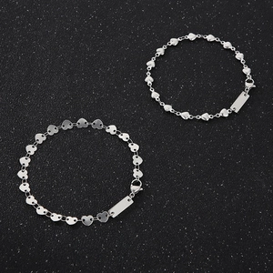 Minimalist silver stainless steel heart link bracelet with customizable rectangular metal tag